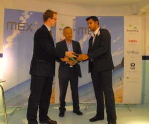 Gaurabh Mathure receiving his MEX Award from Marek Pawlowski of PMN (left) and Mike Grenville of 160Characters.org (centre).